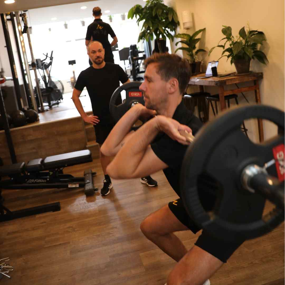 Coached front squat at MudaGym
